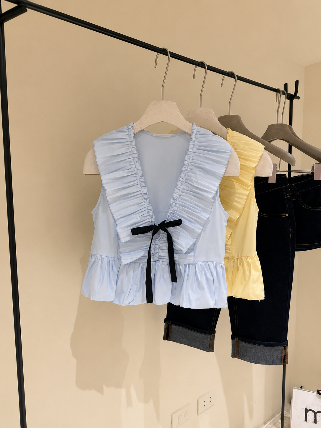 Women’s V-Neck Ruffle Trim Babydoll Blouse - Sleeveless Peplum Top with Contrast Front Tie Bow Accent