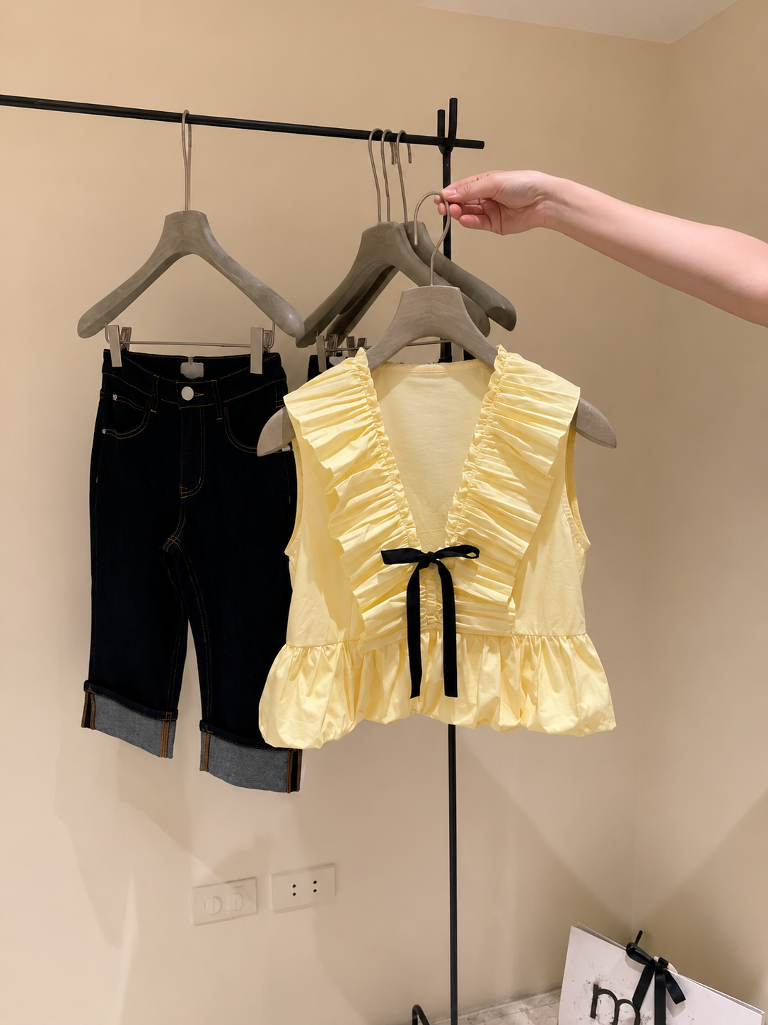 Women’s V-Neck Ruffle Trim Babydoll Blouse - Sleeveless Peplum Top with Contrast Front Tie Bow Accent