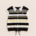 A short-sleeve knit top with horizontal black, white, and pale yellow stripes, featuring a white crochet collar, a button-up front, and a small yellow embroidered heart on the chest.